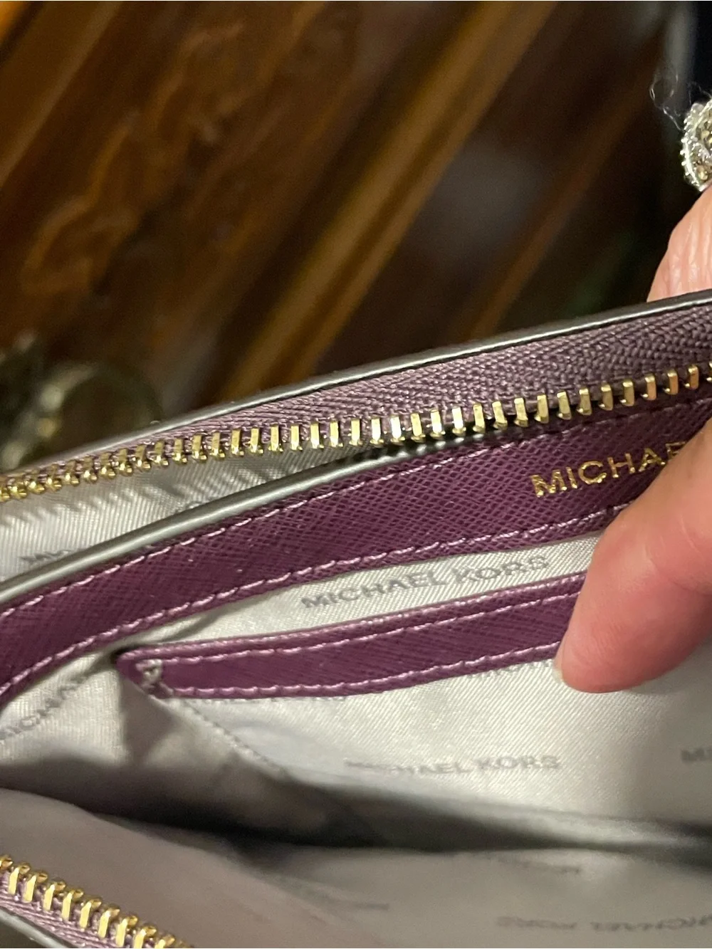 MICHAEL KORS  Brooklyn Plum Wristlet with Gold Eyelet Detail